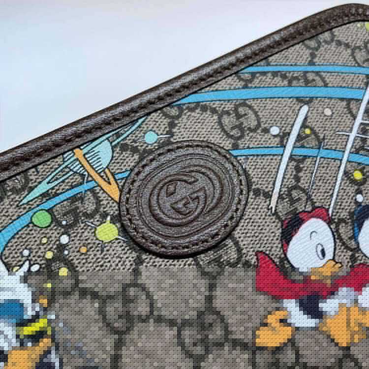 disney x G*u*i donald duck cosmetic case